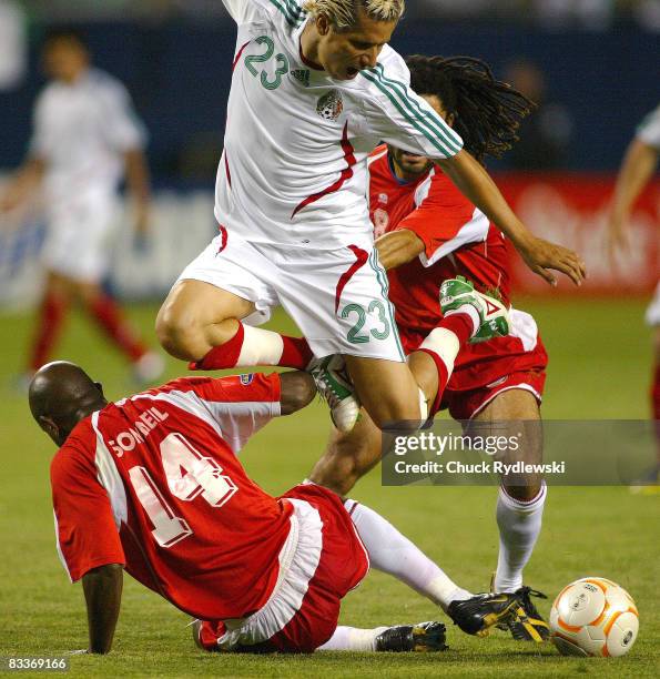 Mexico's Adolfo Bautista tries to split the Guadeloupe defense during their semi-final match Mexico vs Guadeloupe at the CONCACAF 2007 Gold Cup at...