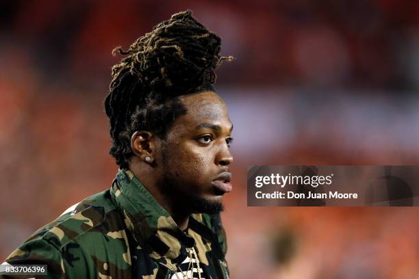 Former Alabama Crimson Tide running back and Heisman Trophy winner Derrick Henry stands on the field prior to the 2017 College Football Playoff...