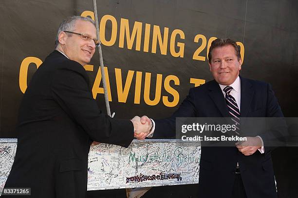 Caesars Palace President Gary Selesner and General Manager John Unwin shake hands over the final beam of the 23-story, 665-room Octavius Tower at...