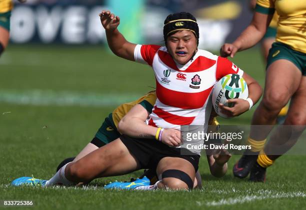 Riho Kurogi of Japan is chased down and tackled by Samantha Treherne of Australia during the Women's Rugby World Cup Pool C match between Australia...