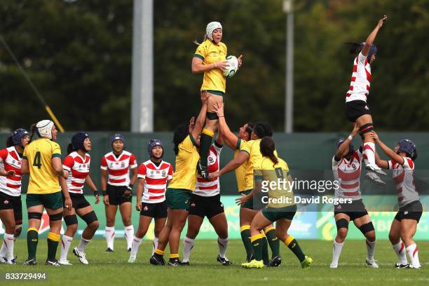 Chloe Butler of Australia catches the ball during the Women's Rugby World Cup Pool C match between Australia and Japan at Billings Park UCD on August...
