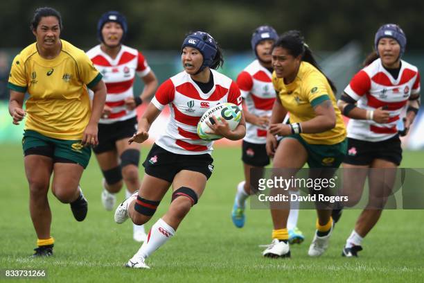 Sayaka Sazuki of Japan runs with the ball during the Women's Rugby World Cup Pool C match between Australia and Japan at Billings Park UCD on August...