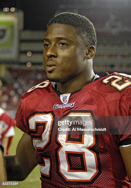 Running back Warrick Dunn of the Tampa Bay Buccaneers plays against the Seattle Seahawks at Raymond James Stadium on October 19, 2008 in Tampa,...