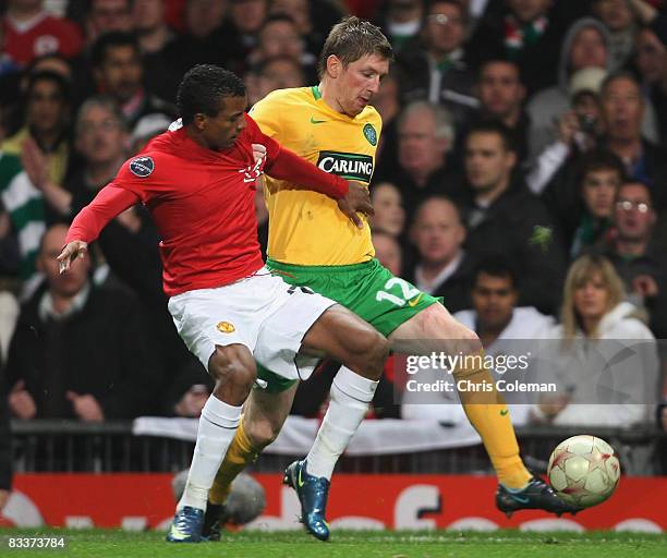 Nani of Manchester United clashes with Mark Wilson of Celtic during the UEFA Champions League Group E match between Manchester United and Celtic at...