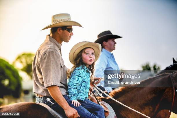 Cowboy Family on Horseback