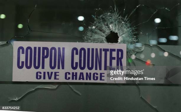 Mumbai Terror Attack: Bullet shot is seen at coupon counter.
