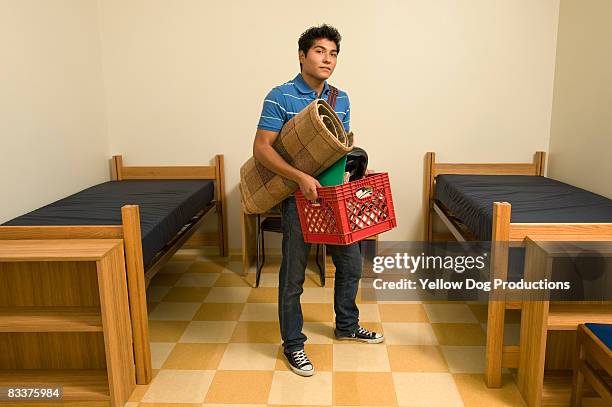 new college student entering dorm room - dorm room stock pictures, royalty-free photos & images