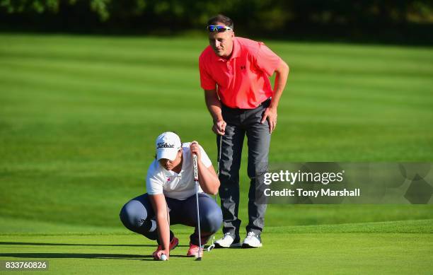 John Cheetham and Olivia Raybould of Three Hammers Golf Complex line up their putt on the 18th green during the Golfbreaks.com PGA Fourball...