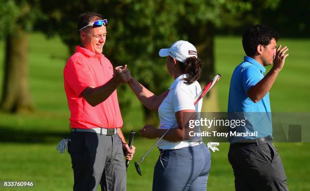 John Cheetham and Olivia Raybould of Three Hammers Golf Complex shake hands at the end of their second round during the Golfbreaks.com PGA Fourball...