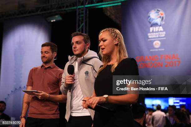 Spencer "Gorilla" Ealing of England is interviewed by Spencer Owen and Laura Woods during day two of the FIFA Interactive World Cup 2017 Grand Final...