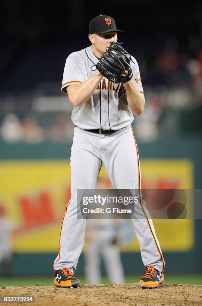 Mark Melancon of the San Francisco Giants pitches in the eighth inning against the Washington Nationals at Nationals Park on August 12, 2017 in...