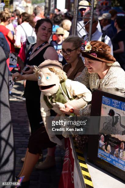 Puppeteer gives a performance on one of the mini-stages on the Royal Mile during the Edinburgh Festival Fringe, on August 17, 2017 in Edinburgh,...