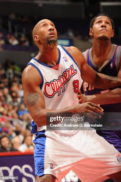 Brian Skinner of the Los Angeles Clippers boxes out against Boris Diaw of the Phoenix Suns at Staples Center on October 21, 2008 in Los Angeles,...