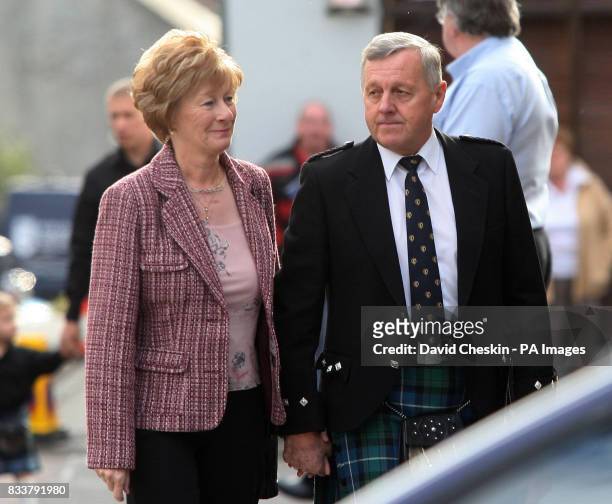 Jim McRae and his wife Margret arrive for the Service of Celebration for their son Colin McRae and their Grandson Johnny McRae taking place at St...