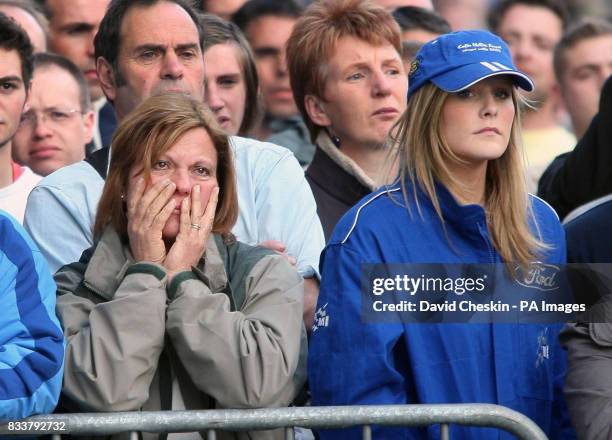 Fans gather to watch the Service of Celebration for Colin and his son Johnny McRae taking place at St Nicholas Church, High Street in Lanark.