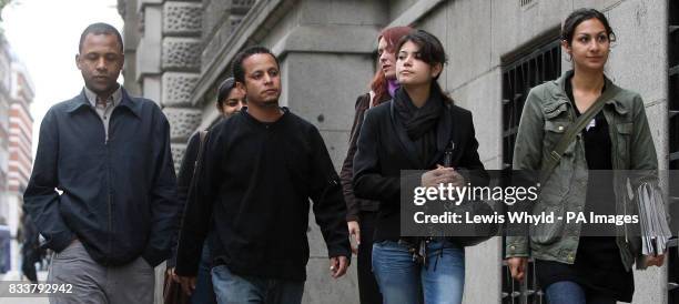 Alternate crop of previously transmitted image. Family friend Elora Ronaldo da Silva, cousin Alessandro Pereira, and cousin Vivian Figueiredo arrive...