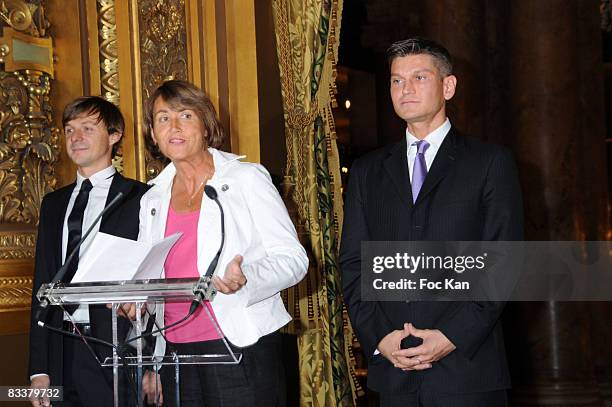 Martin Solveig, Minister Christine Albanel and Antoine Baduel from FG Radio attend the DJ Martin Solveig and Antoine Baduel receive the Chevalier des...