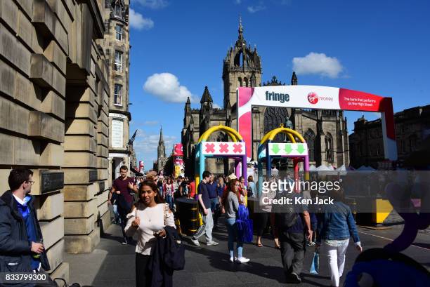 The entrance to the Fringe area on the Royal Mile during the Edinburgh Festival Fringe with newly-introduced security barriers in the foreground and...