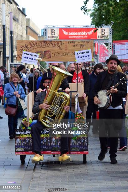 Jazz musicians promote a show during the Edinburgh Festival Fringe, on August 17, 2017 in Edinburgh, Scotland. The Fringe is celebrating its 70th...