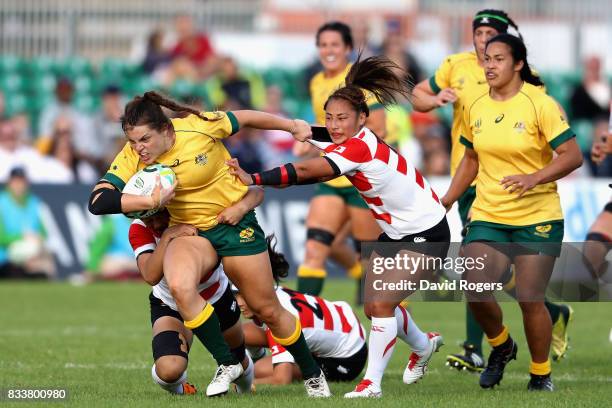 Grace Hamilton of Australis breaks through during the Women's Rugby World Cup Pool C match between Australia and Japan at Billings Park UCD on August...