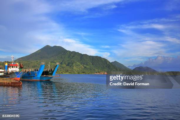 the port and surrounding volcanos near rabaul, p.n.g. - rabaul stock pictures, royalty-free photos & images