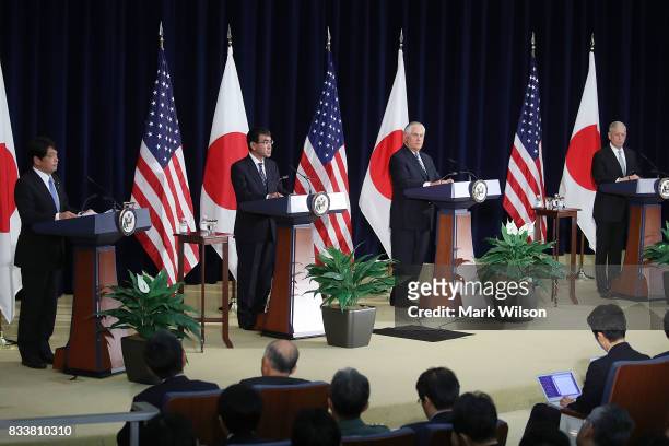Secretary of State Rex Tillerson , Defense Secretary Jim Mattis , stand with Japanese Foreign Minister Taro Kono and Defense Minister Itsunori...