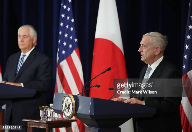 Defense Secretary Jim Mattis speaks about North Korea while flanked by Secretary of State Rex Tillerson after a meeting of the U.S.-Japan Security...