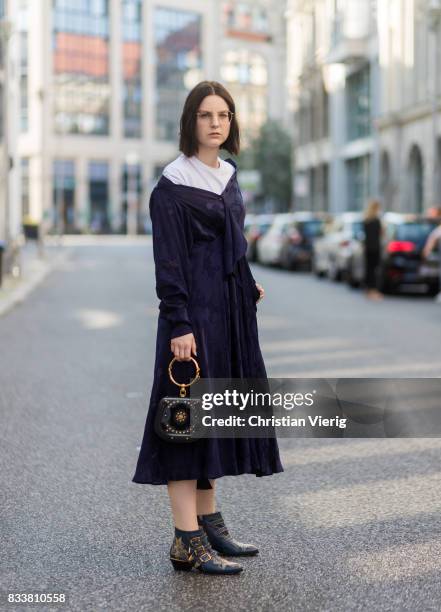 Maria Barteczko wearing a blue maxi dress Diane von Fuerstenberg, blue bracelet bag Chloe, blue ankle boots with studs Chloe, white shirt Acne, Ray...