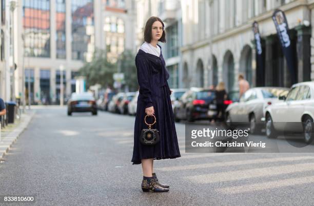 Maria Barteczko wearing a blue maxi dress Diane von Fuerstenberg, blue bracelet bag Chloe, blue ankle boots with studs Chloe, white shirt Acne, Ray...