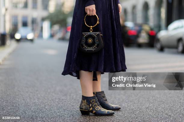 Maria Barteczko wearing a blue maxi dress Diane von Fuerstenberg, blue bracelet bag Chloe, blue ankle boots with studs Chloe, white shirt Acne, Ray...