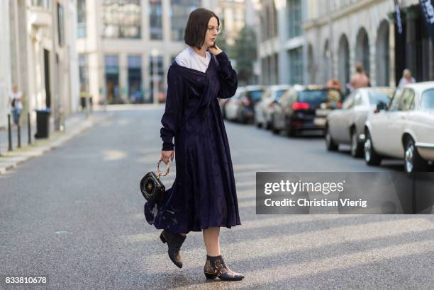 Maria Barteczko wearing a blue maxi dress Diane von Fuerstenberg, blue bracelet bag Chloe, blue ankle boots with studs Chloe, white shirt Acne, Ray...