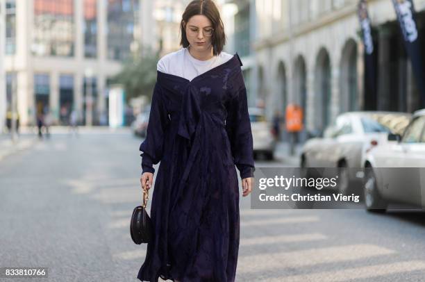 Maria Barteczko wearing a blue maxi dress Diane von Fuerstenberg, blue bracelet bag Chloe, blue ankle boots with studs Chloe, white shirt Acne, Ray...