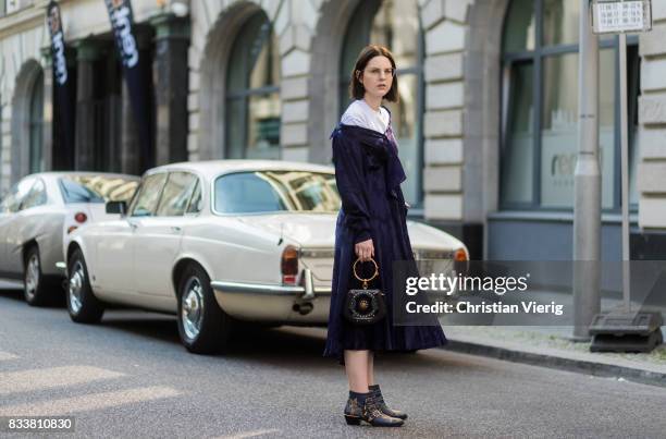 Maria Barteczko wearing a blue maxi dress Diane von Fuerstenberg, blue bracelet bag Chloe, blue ankle boots with studs Chloe, white shirt Acne, Ray...