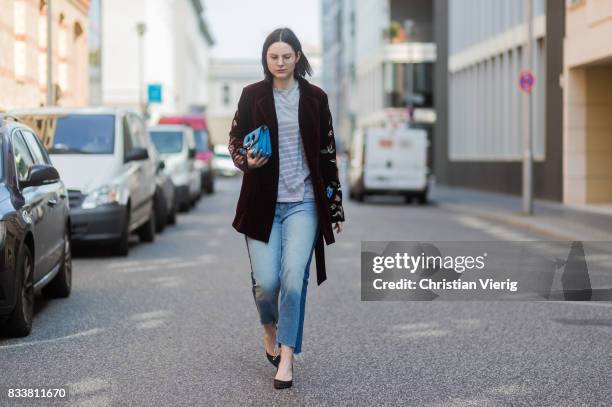 Maria Barteczko wearing bordeaux floral velvet jacket Bazar Deluxe, striped shirt Isabel Marant Etoile, reworked jeans Zara, black satin slingbacks...