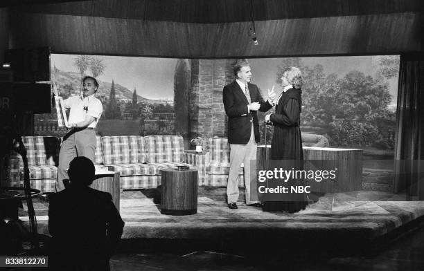 Pictured: Announcer Ed McMahon, host Johnny Carson as Aunt blabby on April, 30th 1975 --