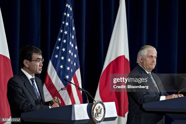 Taro Kono, Japan's foreign minister, left, speaks as Rex Tillerson, U.S. Secretary of State, listens at a news conference during the Security...