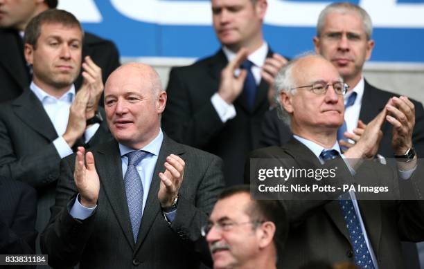 Chelsea owner Roman Abramovich is joined in the stands by Peter Kenyon, Cheif Executive , Brunce Buck, Chairman and Eugene Tenenbaum