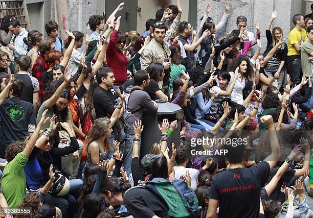 Studentsvote during a meeting and block the entrance of Naples university on October 22, 2008. Prime Minister Silvio Berlusconi defended earlier...