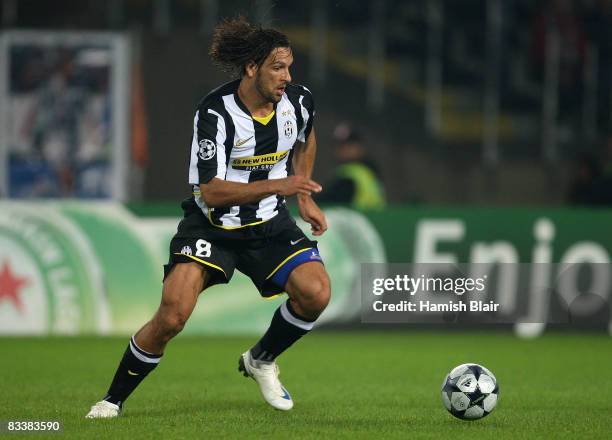 Amauri of Juventus runs with the ball during the UEFA Champions League Group H match between Juventus and Real Madrid at the Stadio Olimpico on...