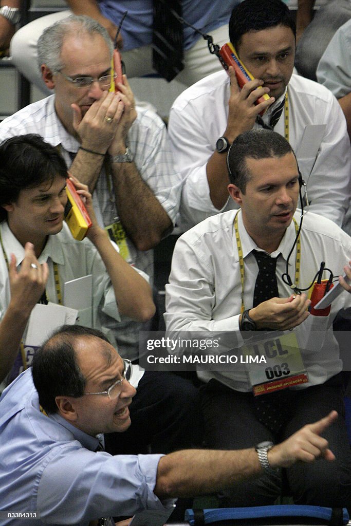 Stock traders negotiate in the iBovespa
