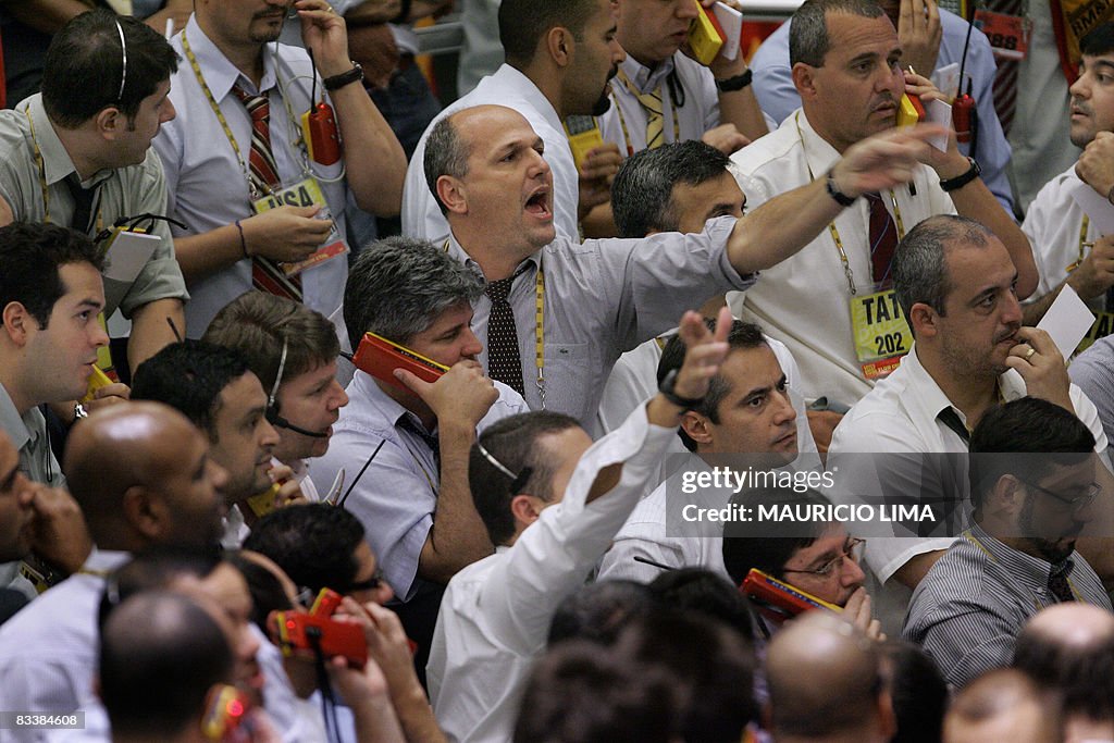Stock traders negotiate in the iBovespa