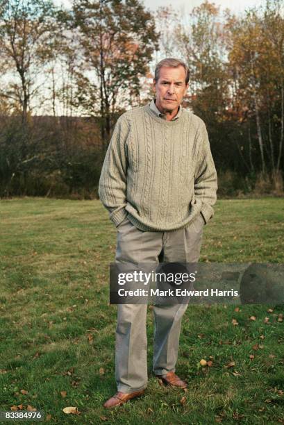 Canadian-born American journalist Peter Jennings poses with his hands in his pockets on the grass at the Eddie Adams Workshop, Jeffersonville, New...