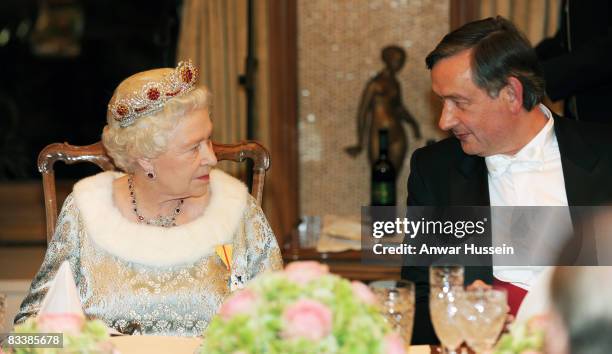 Queen Elizabeth ll chats to President Danilo Turk during a State Banquet at Brdo Castle on the first day of a State Visit to Slovenia on October 21,...