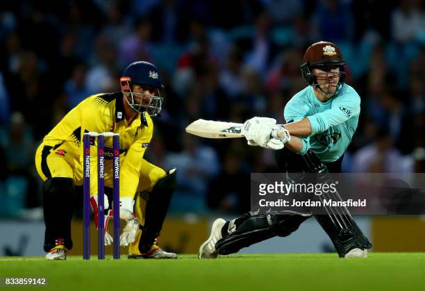 Rory Burns of Surrey bats as Phil Mustard of Gloucestershire keeps wicket during the NatWest T20 Blast match between Surrey and Gloucestershire at...