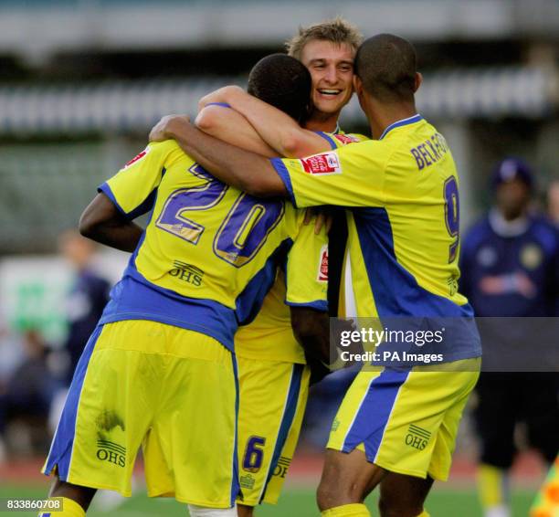 Leeds United's Tresor Kandol celebrates scoring the only goal of the game with team mates Jermaine Beckford and Matt Heath during the Coca-Cola...