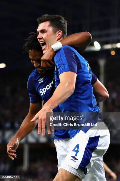 Michael Keane of Everton celebrates scoring the opening goal during the UEFA Europa League Qualifying Play-Offs round first leg match between Everton...