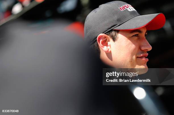 Joey Logano, driver of the Discount Tire Ford, stands by his car during practice for the NASCAR Xfinity Series Food City 300 at Bristol Motor...