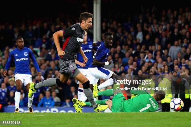 Idrissa Gueye of Everton scores his sides second goal during the UEFA Europa League Qualifying Play-Offs round first leg match between Everton FC and...