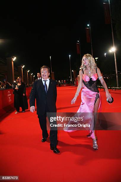 Valeria Marini and producer Vittorio Cecchi Gori arrive at the Marc'Aurelio Acting Award during the 3rd Rome International Film Festival held at the...