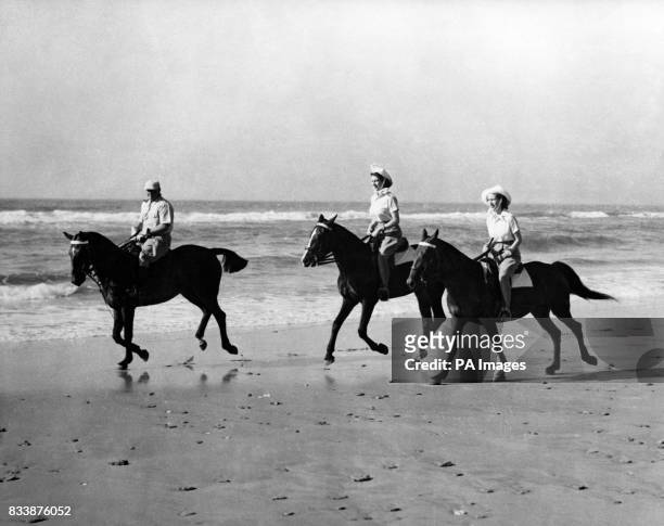 The Princesses enjoyed an off-duty break from the royal tour of South Africa when they went riding on the golden sands of Bonza Beach, East London,...